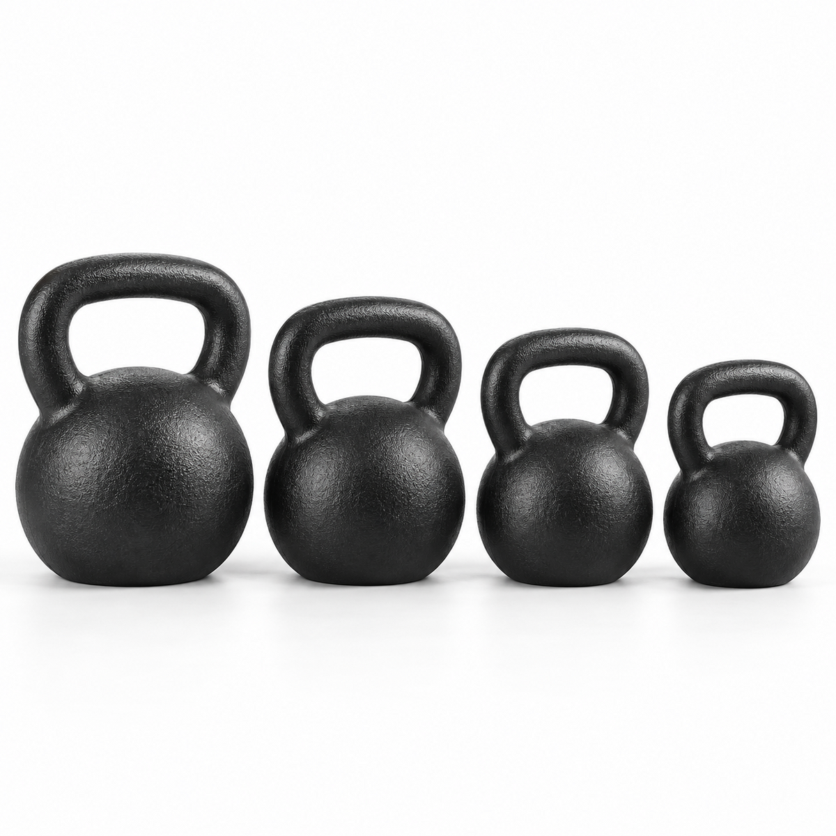 Four unbranded cast-iron kettlebells representing the York Hercules Power package: 80, 70, 60, and 50 lb.